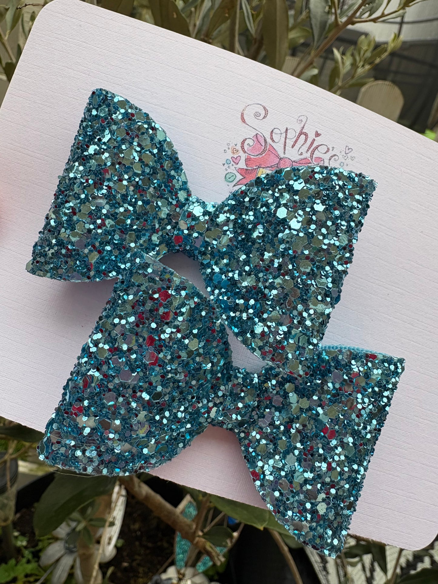Icy Blue Chunky glitter 2.5inch Pigtail Bows