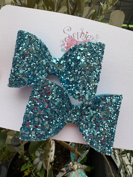 Icy Blue Chunky glitter 2.5inch Pigtail Bows